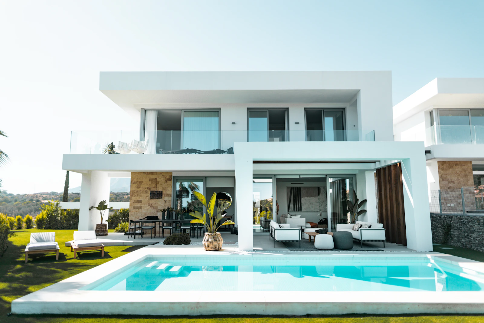Illustrative contemporary villa framed by a house silhouette